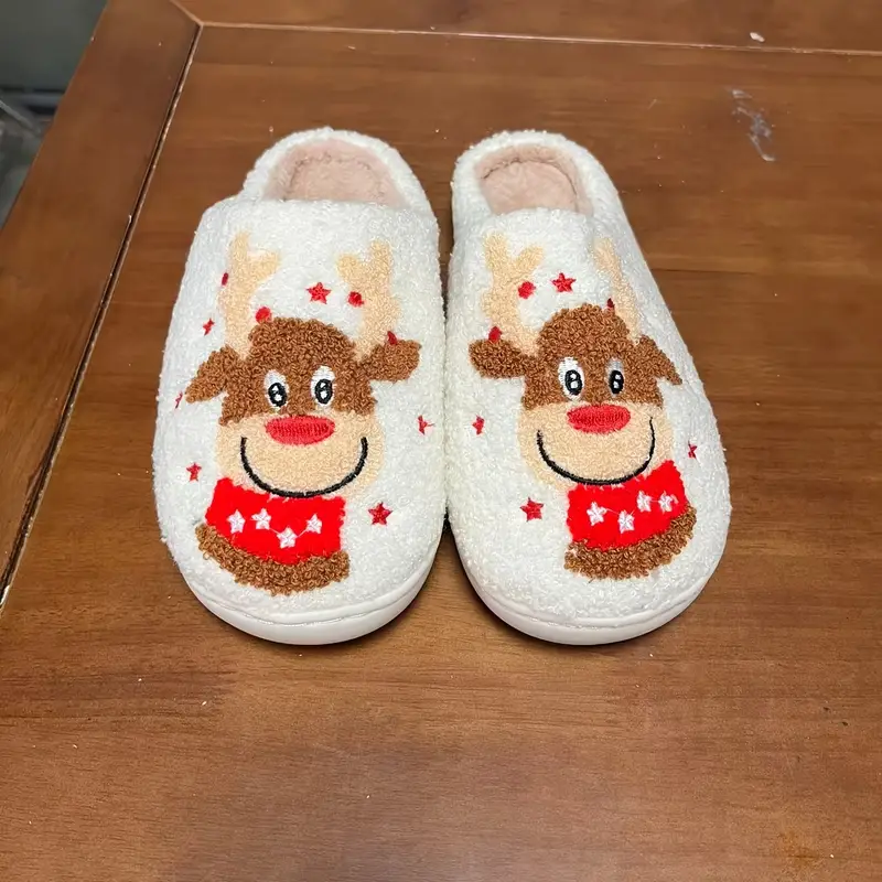 Pantofole morbide di Natale con renne rosse e bianche