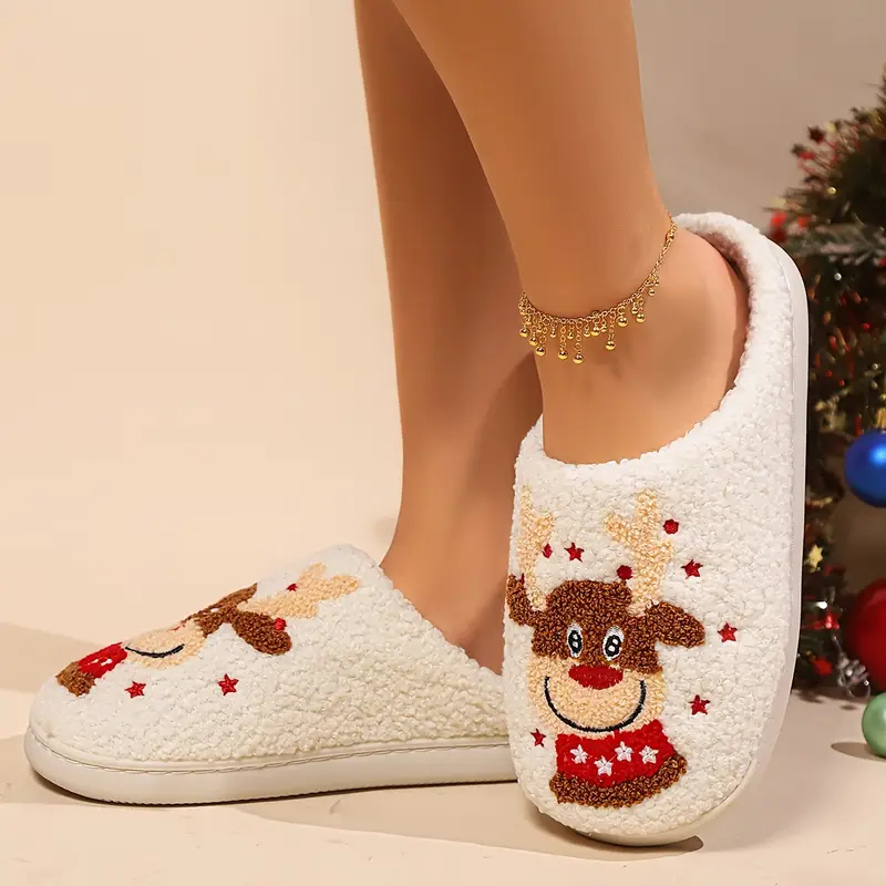 Pantofole morbide di Natale con renne rosse e bianche