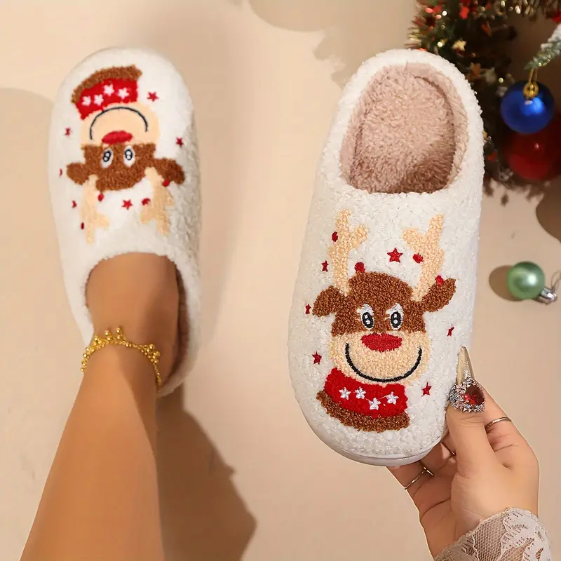 Pantofole morbide di Natale con renne rosse e bianche
